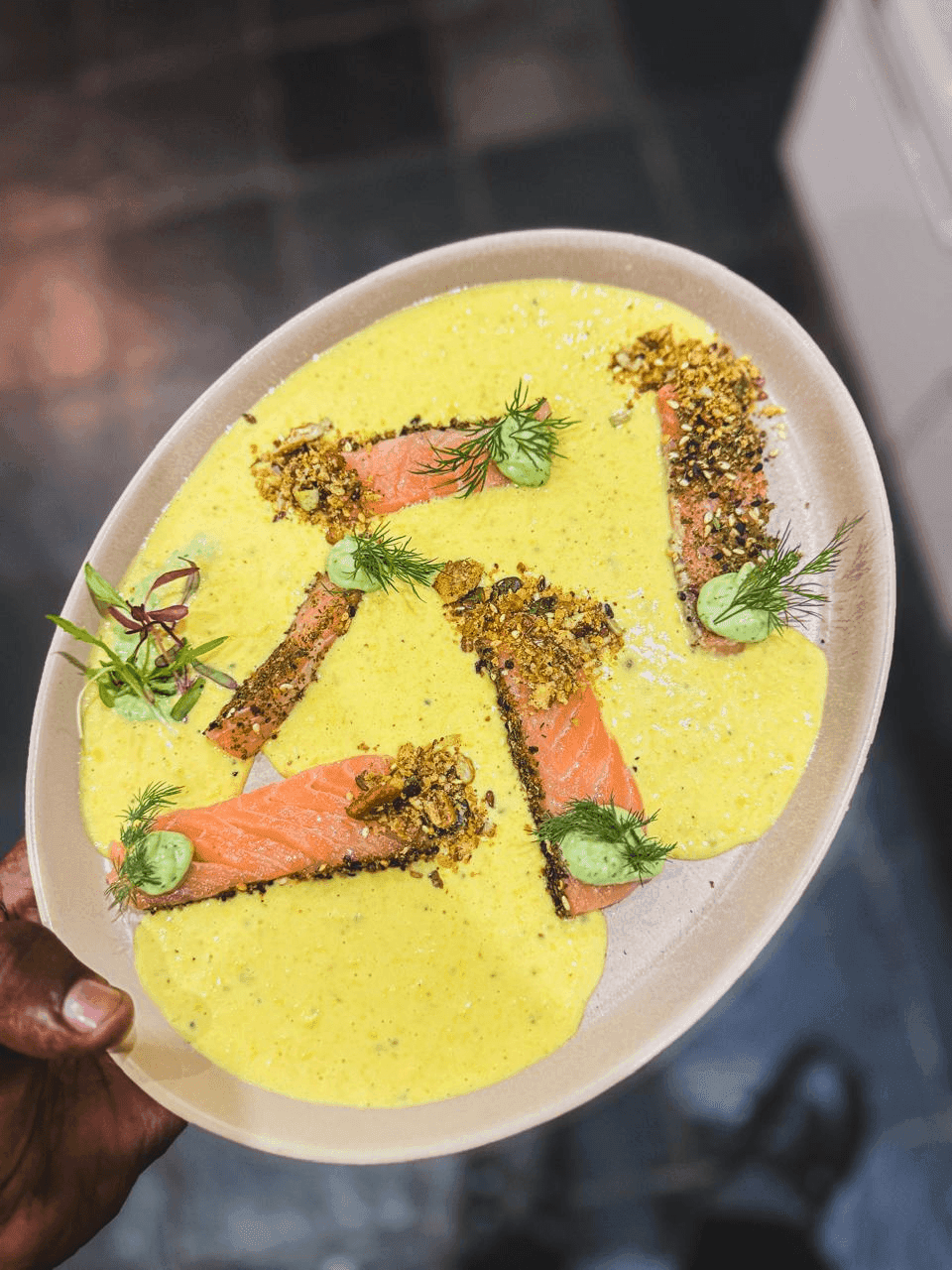Sesame-crusted lightly smoked salmon on a charred corn crudo.